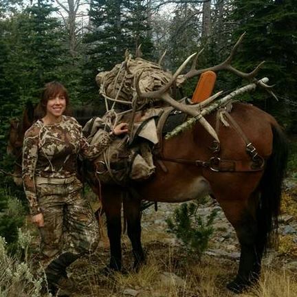 Woman with Big Elk on Brown Mule
